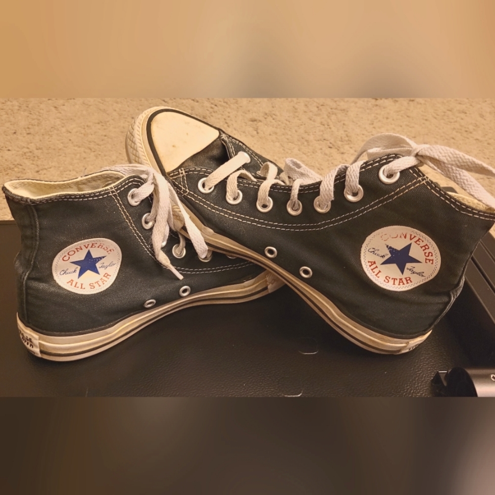 Chuck Taylor's black and white Converse high tops